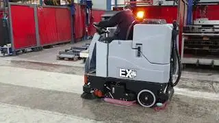 Tomcat EX33C rider scrubber dryer cleaning factory floor