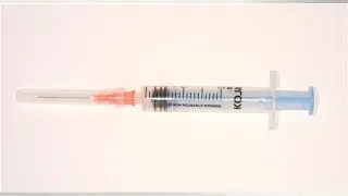 Man threatened to stab shop worker with syringe filled with red liquid, court hears