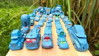 Convoy of muddy Disney cars falls into the water! Clean up toys in the lake.