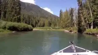 North River jet boat dodging logs