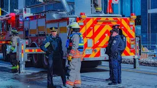 Toronto fire crews o/s of a commercial fire