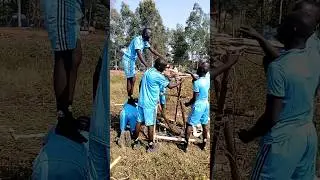 Lango college scouts cook one metre above the ground at Akii Bua camping site
