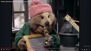 Harvey beaver Playing God Will Provide All Our Needs on his Kazoo