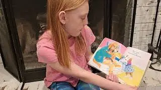  Ginger reading The Hug Book