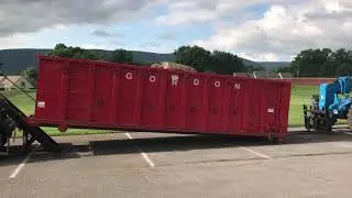 40 yard rolloff container picked up by truck