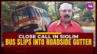 Shuttle Bus Skids into Gutter; All Passengers Safe