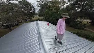 she missed nothing marking every screw for a perfect metal roof