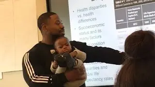 HBCU professor goes viral for holding student's baby during class