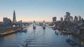 Aerial View Of Iconic Tower Bridge At Twilight Overlooking London Skyline England Uk 4K Stock Video