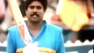 India - Cricket.  Kapil Dev batting with Young Sachin Tendulkar