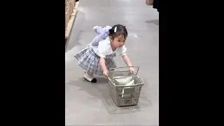 Shopping makes her busy. Cute baby behaviors