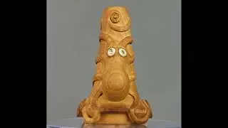 Octopus Hat in yew wood by Haida artist Ron Russ