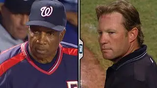 Frank Robinson, umpire Jim Wolf engage in tense staredown