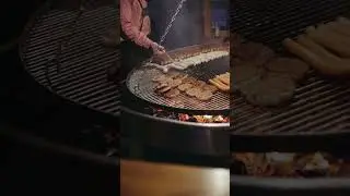 The swinging grill makes all the food cook evenly! #shorts #cooking  #grilling