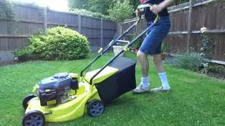Mowing lawn with Challenge XSS40E petrol mower