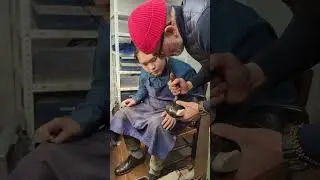 Norman Vilalta reviewing hand-finishing techniques with the Busetto iron tool. #shoemaking
