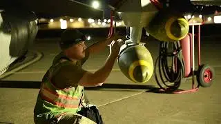 Loading live weapons onto an F-16 Fighting Falcon 