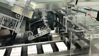 Manual feeding cartoning machine