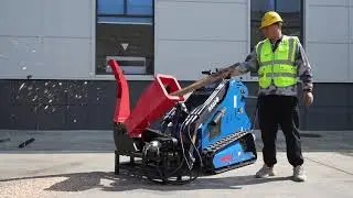Rippa RS03 mini skid steer with the Wood Chipper attachment.