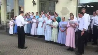 Members of the Green Mountain Mennonite church sing at the four corners of Bennington on Friday, Jul