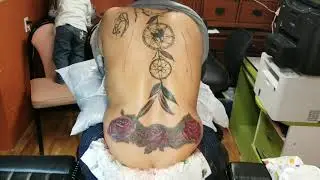 Roses on female lower back tattoo by Boris Kuryakin, May 05, 2018.