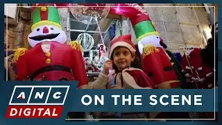 'Merry Christmas from the ho, ho, holy land!' Jerusalem ushers Christmas with music, marching Santas
