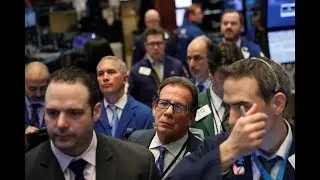 Dow sinks 665 points