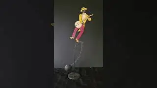 Americana  Magnificence- Vintage pendulum balancing toy banjo player (no music included)