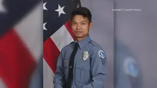 Officer killed, another seriously injured in shooting at Georgia hotel