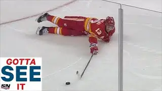 GOTTA SEE IT: Johnny Gaudreau Blows A Tire, Deflects Puck Into Flames' Net