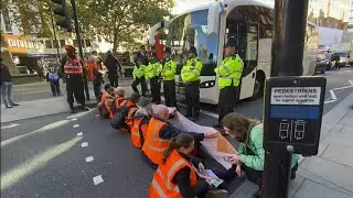 Just Stop Oil protests: Emergency vehicles blocked in Knightsbridge in London (UK)