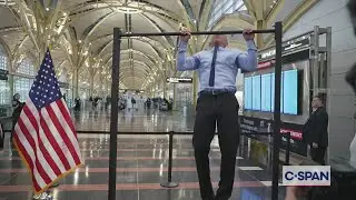 Pull-up competition between Secretaries Kennedy and Duffy.