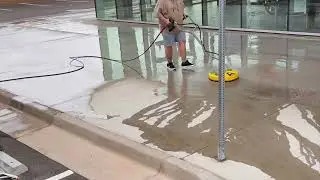 Pressure washing car dealership!