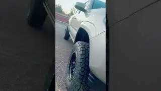 Lifted Toyota Tacoma: AMP Research PowerStep Electric Running Boards