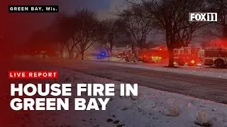 Live report as crews battle house fire on Green Bay's west side