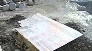Huge block extraction at marble quarry in Italy