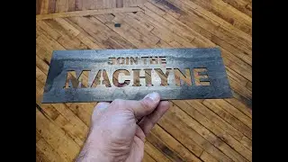 Laser cut MACHYNE faceplate from SendCutSend