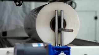 Automatic sleeve wrapping packing machine for cartons