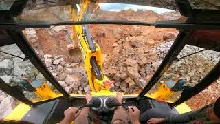 jcb working in a stone quarry // jcb working inside view