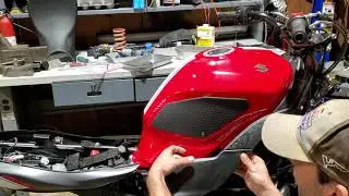 lifting up the tank on a 3rd gen sv650