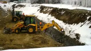 Excavator JCB cu picamer hidraulic