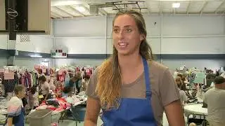 Families stock up on children's clothing for $1