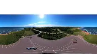 A 360 aerial view above Cavendish Beach on PEI