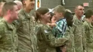 Watch: Toddler can't wait to hug military mom!