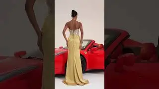 A light yellow evening gown with an elegant.flowing silhouette and soft radiant charm. #fashion