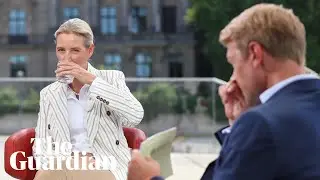 Protesters play 'schei&szlig; AfD' song during interview with far-right co-leader Alice Weidel