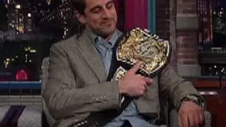 Super Bowl MVP Aaron Rodgers receives the WWE Championship