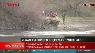 Bir yanda Yunan polisi öte yanda nehri geçmeye çalışan göçmenler. tv100 Canlı Yayınında tarihi anlar