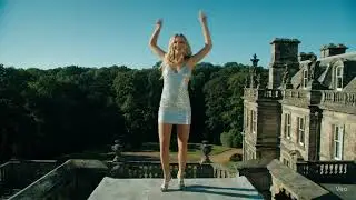 AIFLOSS - AI Blonde Girl Dancing In a White Dress