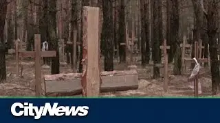 Ukraine: signs of torture at mass burial site